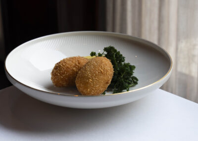 Foto van het gerecht garnaalkroketjes en/of kaaskroketjes