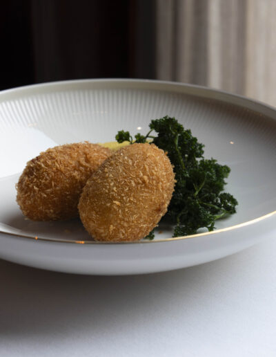 Foto van het gerecht garnaalkroketjes en/of kaaskroketjes
